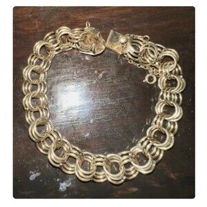 Wells jewelry 12kt Gold Filled Bracelet with safety Chain